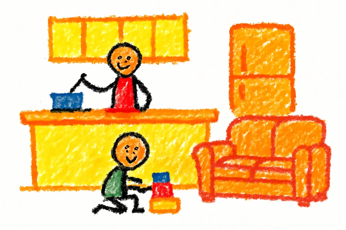 対面キッチンからリビングを見守る様子